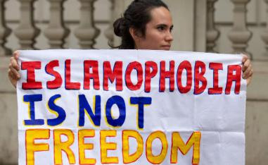 A protester participates in an anti-Islamophobia demonstration in London