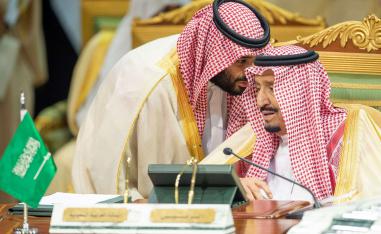Saudi Arabia's Crown Prince Mohammed bin Salman talks with Saudi Arabia's King Salman bin Abdulaziz Al Saud during the Gulf Cooperation Council's (GCC) Summit in Riyadh, Saudi Arabia December 9, 2018. 