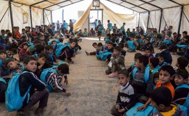Over the years, Hammam al-Alil 2 became a bustling settlement: rows of tents with water and electricity access, plus storefronts, playgrounds, and a health centre