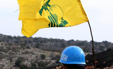 Picture taken from the southern Lebanese village of Meiss al-Jabal on December 16, 2018, shows a United Nations Interim Forces in Lebanon (UNIFIL) soldier monitoring the border between Lebanon and Israel.