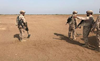 Members of the UAE armed forces secure an area while searching for landmines in Al-Mokha, Yemen March 6, 2018.