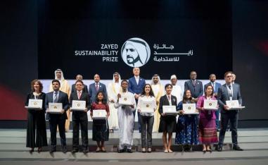 Abu Dhabi Crown Prince Sheikh Mohammed bin Zayed al-Nahyan (2nd row, 4th L) and UAE Vice-President Sheikh Mohamed bin Rashid Al Maktoum (2nd row, 6th L) pose with the winners of the Zayed Sustainability Prize for Energy.