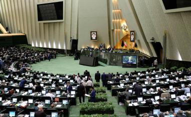 Iran's Foreign Minister Mohammad Javad Zarif delivers a speech to the parliament in Tehran on October 7, 2018, over a bill to counter terrorist financing.