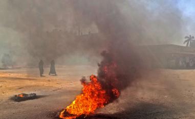 Sudanese protestors burn tires during an anti-government demonstration on January 18, 2019 in the capital Khartoum.
