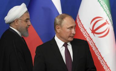 الرئيس الروسي فلاديمير بوتين والرئيس الإيراني حسن روحاني