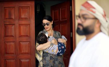 علي السيد وزوجته مينا ليتشيوني وطفلهما