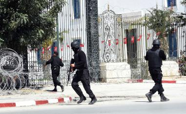 Tunisian security forces secure the area after gunmen attacked Tunis' famed Bardo Museum on March 18, 2015.