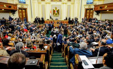 Egypt's Parliament Speaker Ali Abdel-Aal (C) chairs a parliament plenary session to deliberate the proposed constitutional amendments to increase office term durations for the country's president from four to six years, in the capital Cairo on February 14, 2019.