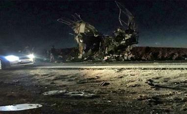 A picture released by the semi-governmental agency Fars News shows the damaged bus that was carrying members of Iran's Revolutionary Guards 