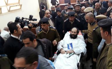 Ramon Rasmi Mansour, known as Faltaous al-Makari, lies on a stretcher after his and monk Isaiah's (not seen) trial session, at the courthouse in a courtroom where he was convicted along with Wael Saad, known as Isaiah al-Makari, of murdering Bishop Epiphanius, the abbot of Saint Macarius Monastery northwest of Cairo, in Damanhour, Egypt February 23, 2019.