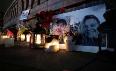 Flowers and candles in memory of Louisa Vesterager Jespersen and Maren Ueland at the Town Hall Square in Copenhagen
