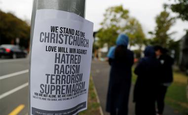 A sign is seen after Friday's mosque attacks outside a community center near Masjid Al Noor in Christchurch