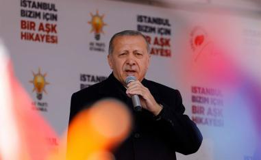 Turkish President Tayyip Erdogan addresses his supporters during a rally for the upcoming local elections in Istanbul
