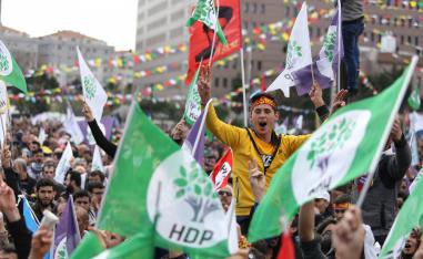 People wave pro-Kurdish Peoples' Democratic Party (HDP) flags during a gathering to celebrate Nowruz, which marks the arrival of spring and the new year, in Istanbul, Turkey March 24, 2019.