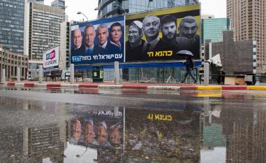 Elections billboards of the Blue and White party leaders, from left to right, Moshe Yaalon, Benny Gantz, Yair Lapid and Gabi Ashkenazi, alongside a panel on the right showing Prime Minister Benjamin Netanyahu flanked by extreme right politicians, from the left, Itamar Ben Gvir, Bezalel Smotrich and Michael Ben Ari in Ramat Gan, Israel, Saturday, March 16, 2019.