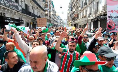 Algerians gather during an anti government demonstration in the capital Algiers 