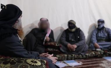 Chief of the Islamic State group Abu Bakr al-Baghdadi (1st-L) appears for the first time in five years in a propaganda video
