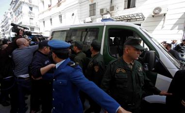 The former central bank governor is the first government official to appear before prosecutors since mass protests