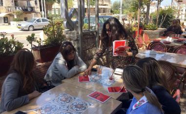An activist distributes pro-boycott leaflets in the port city of Haifa ahead of Israel's election, Israel March 21, 2019.
