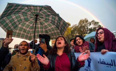 Supporters of Morocco's al-Hirak al-Shaabi movement shout slogans calling for the release of the movement's members outside the Casablanca Court of Appeals during their trial on April 5, 2019.