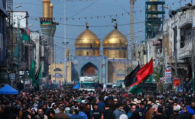 Shiite pilgrims gather outside the golden-domed shrine of Imam Moussa al-Kadhim, who died at the end of the 8th century, during the annual commemoration of the his death, in Baghdad, Iraq, Tuesday, April 2, 2019.