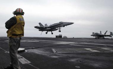 US fighter jet lands on the USS Abraham Lincoln aircraft carrier 