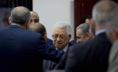 Palestinian President Mahmoud Abbas arrives for a session of the weekly cabinet meeting in Ramallah