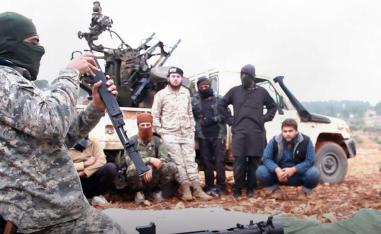 Photo shows al-Qaeda-linked militants learning how to use a heavy weapon in the countryside of Idlib