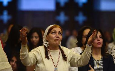 Egyptian women take part in an Easter mass