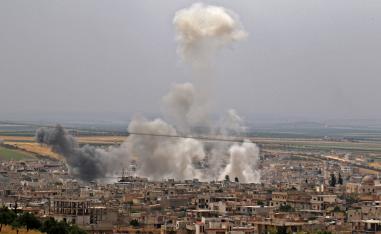 Smoke plumes rising following reported Syrian government forces' bombardment on the town of Khan Sheikhun