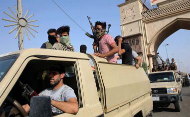 Iran-backed Shiite militias parade in Basra