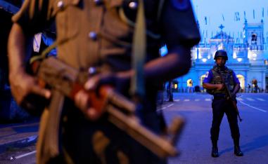 Security personnel stand guard in front of St Anthony's Shrine in Colombo, Sri Lanka
