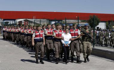 Members of the special forces escort suspects of a failed coup in 2016 on Aug. 1, 2017