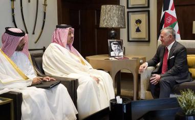 Jordanian King Abdullah II (R) receiving Qatar's Deputy Prime Minister of Qatar and Minister of State for Defence Affairs Khalid bin Mohammed Al-Attiyah (C) in the capital Amman