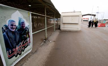 Poster featuring Iranian commander Qassem Soleimani is seen at the Iran-Iraq border