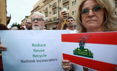A group of Lebanese activists demonstrate in central Beirut to denounce a plan by authorities to install waste incinerators in the country
