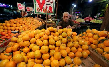 An Egyptian fruit seller is seen at a market in Cairo