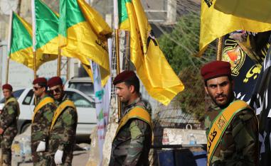Members of the Iraqi Hezbollah Brigades, part of the Hashed al-Shaabi paramilitary units in Baghdad