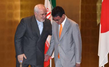 Iranian Foreign Minister Mohammad Javad Zarif talks with his Japanese counterpart Taro Kono