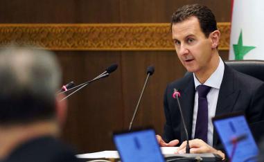 President Bashar al-Assad heading a cabinet meeting in the Syrian capital Damascus