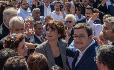 Republican People's Party (CHP) Istanbul Provincial Chair Canan Kaftancioglu (C) leaves the Caglayan court house in Istanbul