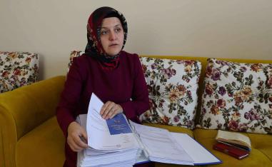 His wife, Sumeyye Yilmaz, says CCTV footage shows him being confronted outside their home after leaving for work