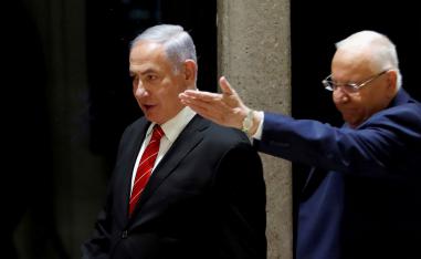 Israeli President Reuven Rivlin and Prime Minister Benjamin Netanyahu arrive at a nomination ceremony at the President's residency