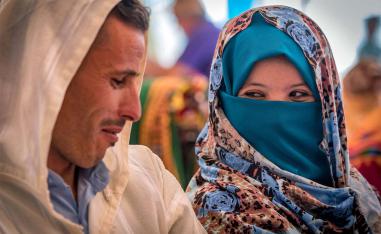 A young Berber couple wait for their wedding ceremony in Imilchil 