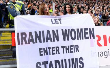 'Let Iranian women enter their stadiums', reads the banner