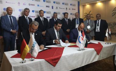From (L to R) Karim Amin, CEO of Siemens Power Generation, Waleed Khaled Hassan, director general, general state company for electricity production north region and Orascom CEO Osama Bishai, sign a contract in the Iraqi capital Baghdad