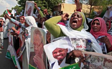 "Down with the Forces of Freedom and Change," the crowd chanted, referring to the umbrella protest movement that brought down Bashir.