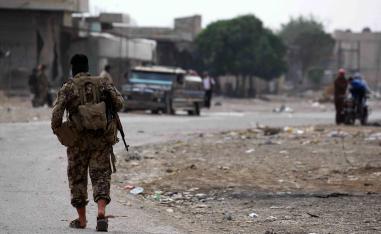 Dozens of fighters in military attire left on pickups, passing by checkpoints manned by Ankara-allied Syrian fighters, the reporter said.