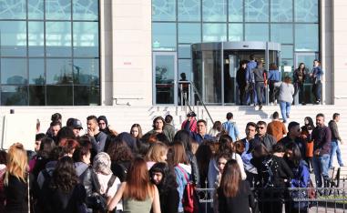 People gather for the first hearing over the killing of Emine Bulut in Kirikkale Courthouse
