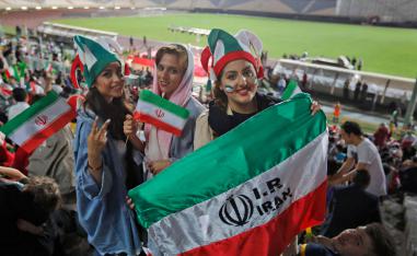 Iranian women watch the World Cup Group B soccer match between Portugal and Iran at Azadi stadium in Tehran